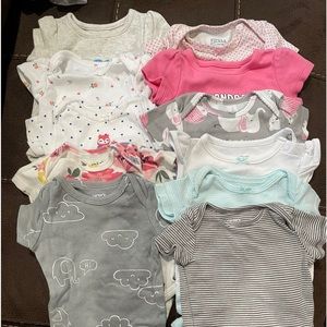 Set of 11 bodysuits. All are new without tags or only worn a few times